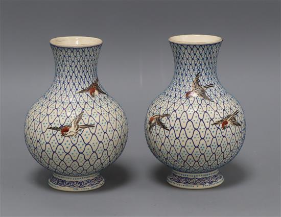 A pair of Japanese earthenware vases, impressed mark height 14.5cm